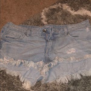 Light blue frayed shorts